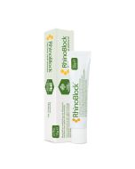 A RhinoBlock nasal ointment tube is shown standing next to its packaging box. The product is designed for hay fever relief and contains pure honey. 